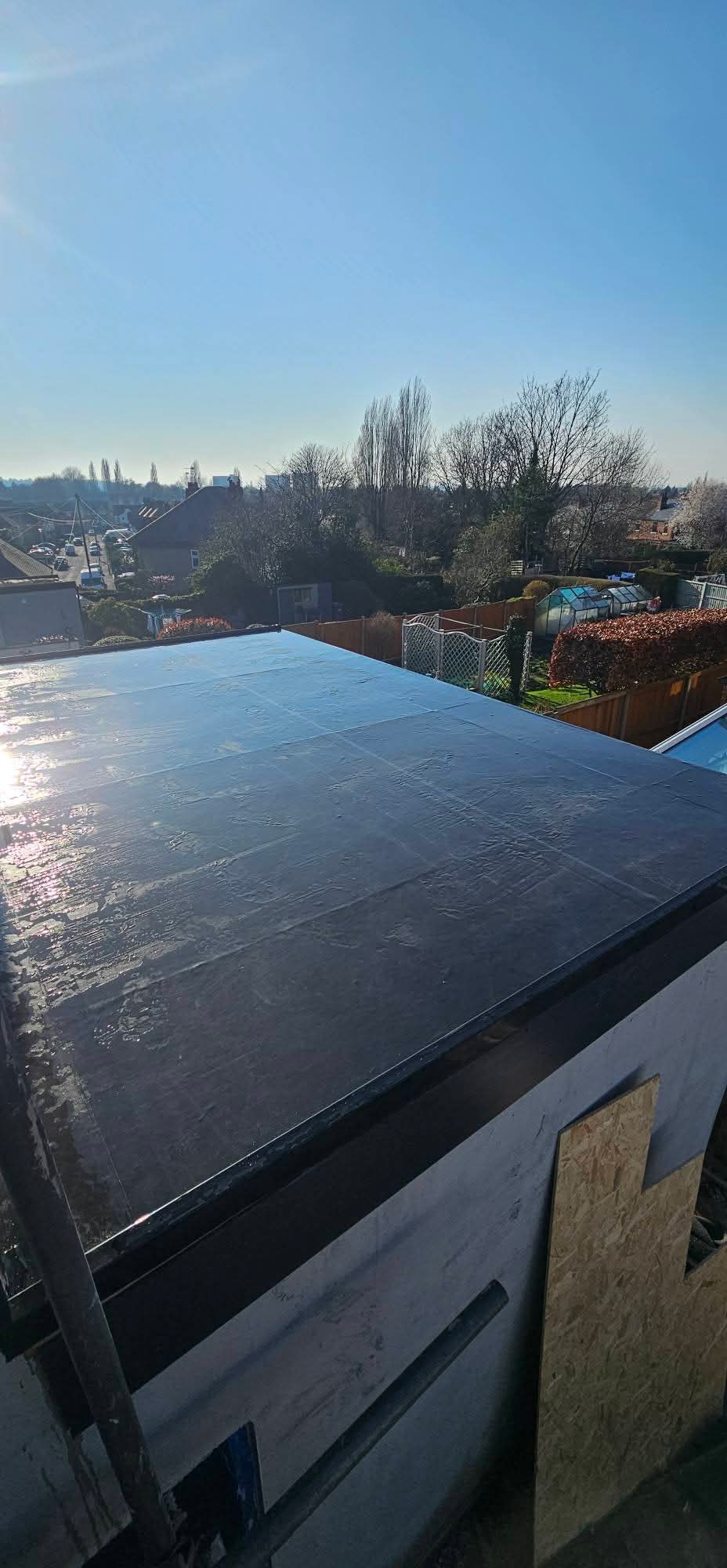 Completed rubber flat roof with new trims