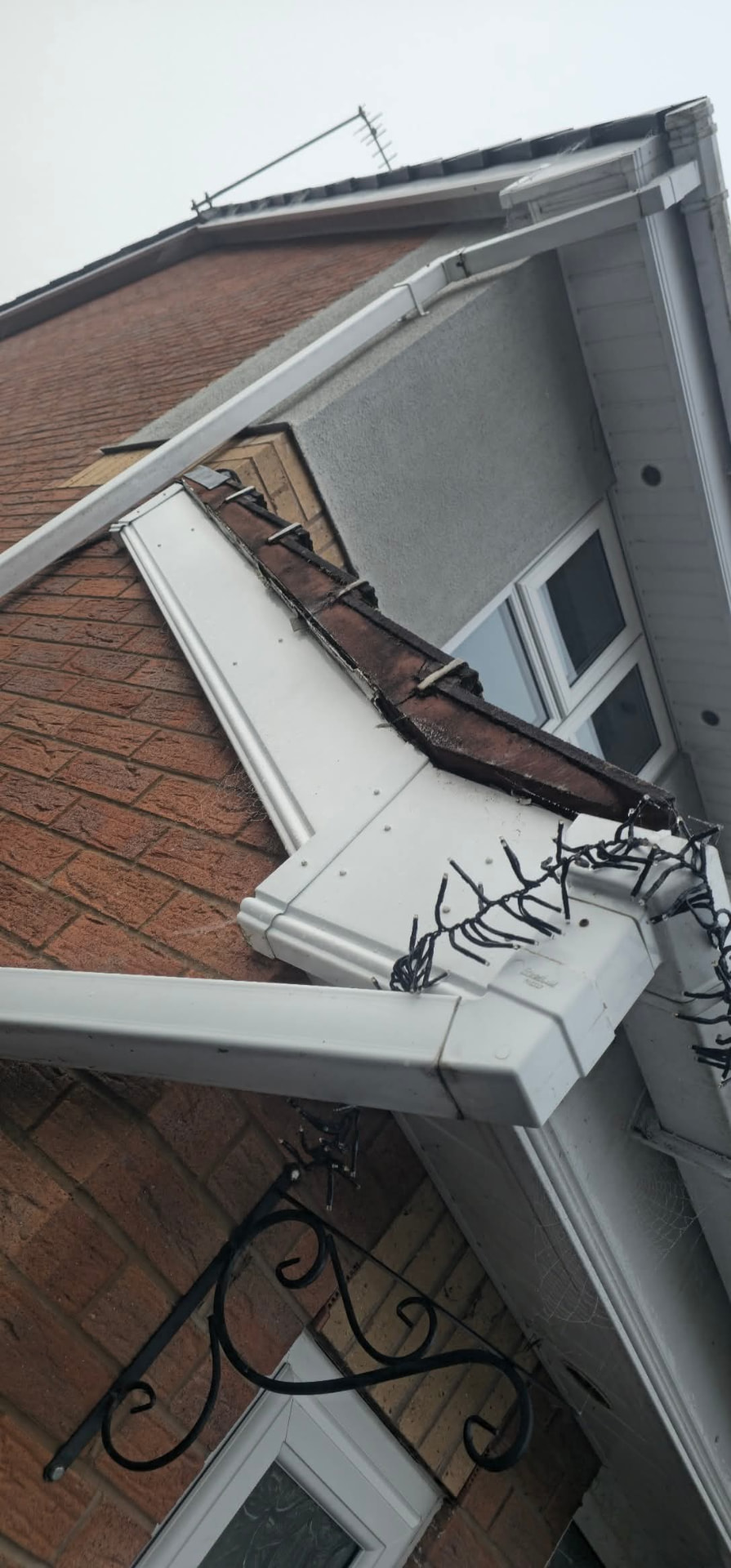 New fascias, soffits and guttering fitted to a house roofline
