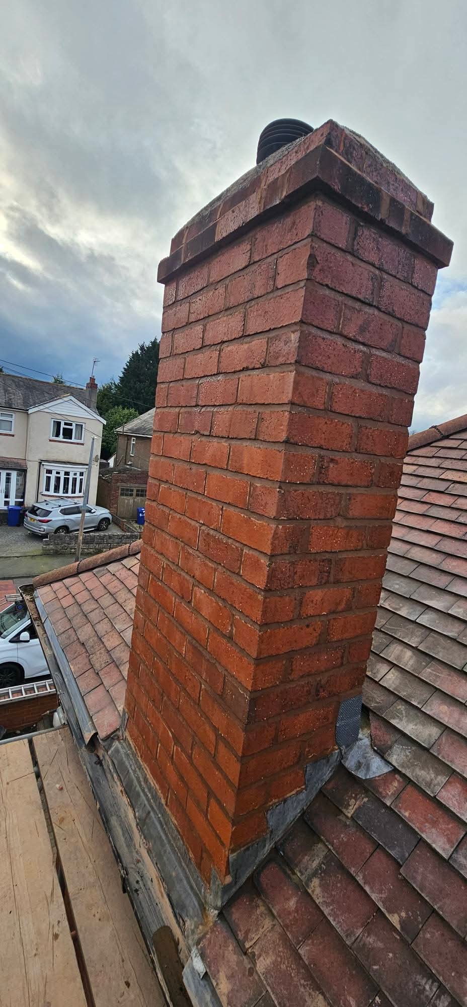 Repointed chimney stack with new leadwork